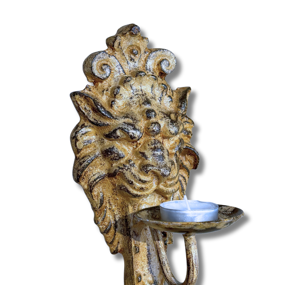 Løvehode lysestake i støpejern