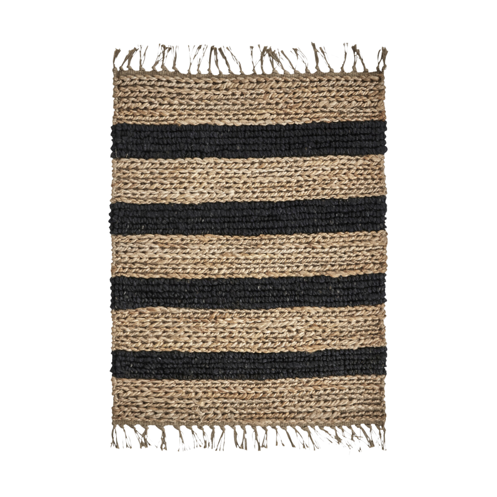 Detalj av Rimi teppe i jute med sorte striper fra House Doctor, naturlig håndvevd design